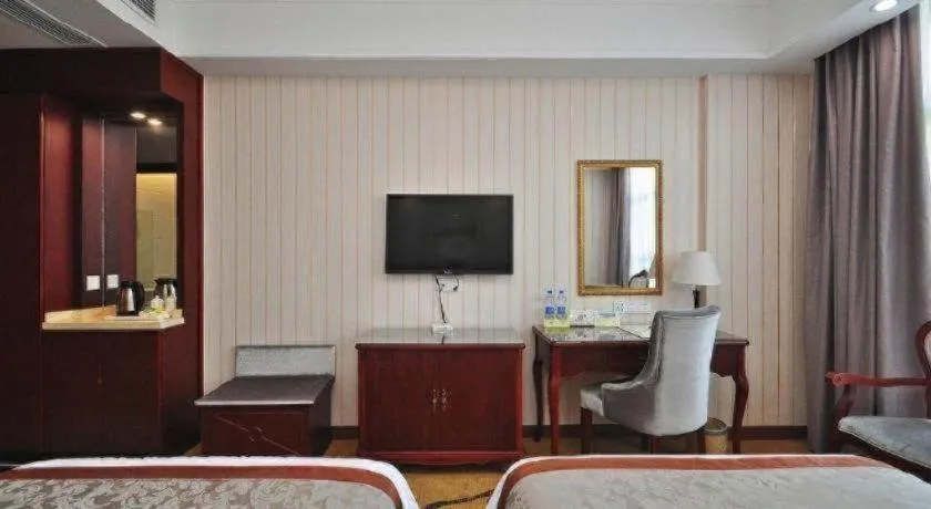 Bed in Vienna Classic Hotel Ningbo Xiangshan Wanda