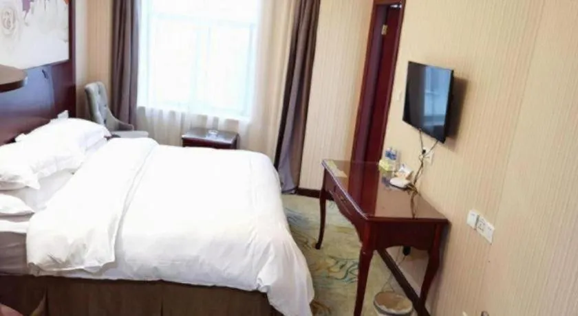 Bed in Vienna Classic Hotel Ningbo Xiangshan Wanda