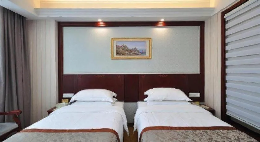 Bed in Vienna Classic Hotel Ningbo Xiangshan Wanda
