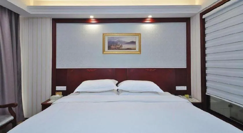 Bed in Vienna Classic Hotel Ningbo Xiangshan Wanda