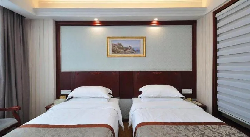 Bed in Vienna Classic Hotel Ningbo Xiangshan Wanda
