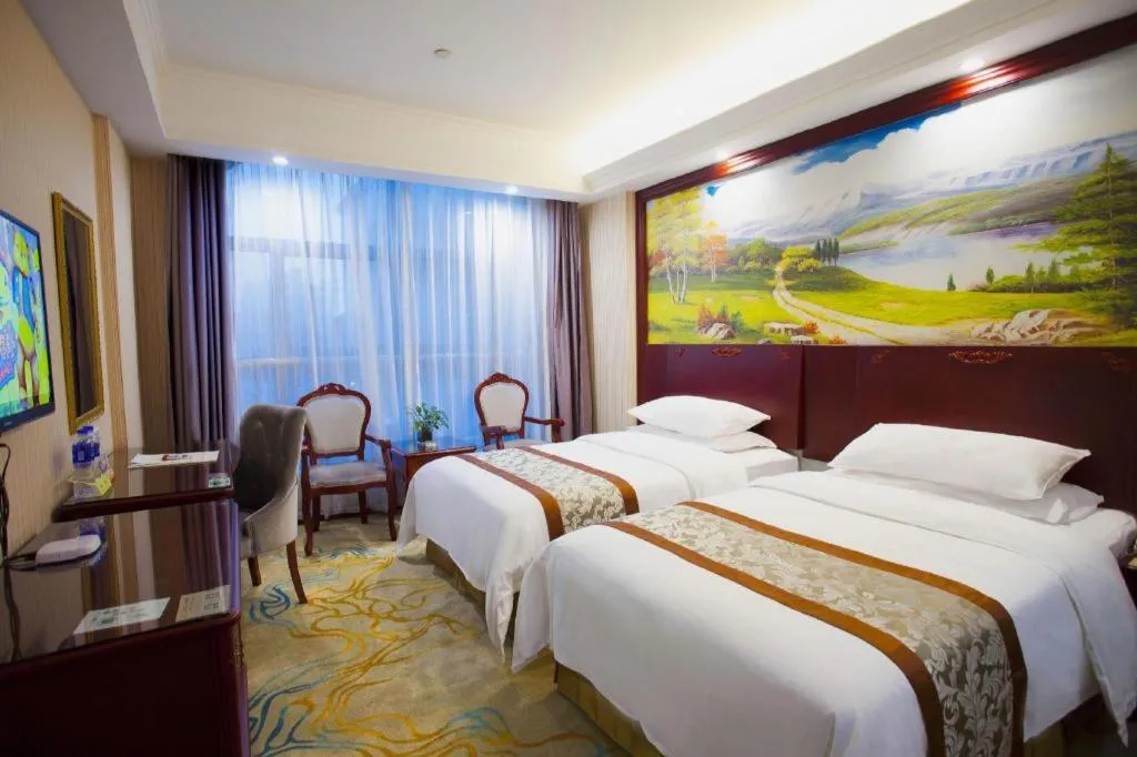 Bed in Vienna Classic Hotel Ningbo Xiangshan Wanda