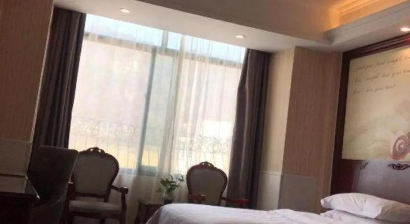 Bed in Vienna Classic Hotel Ningbo Xiangshan Wanda