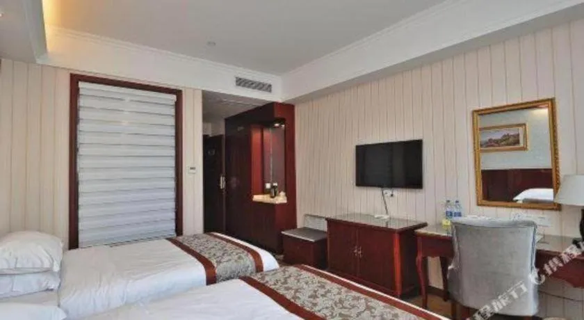 Bed in Vienna Classic Hotel Ningbo Xiangshan Wanda