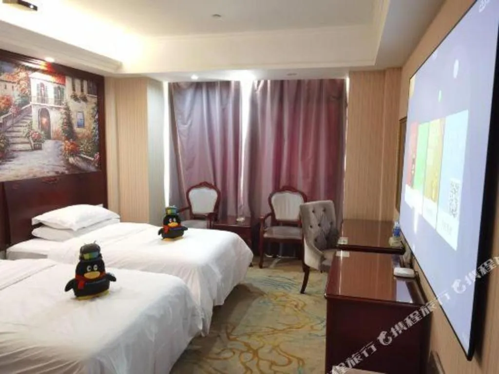 Bed in Vienna Classic Hotel Ningbo Xiangshan Wanda