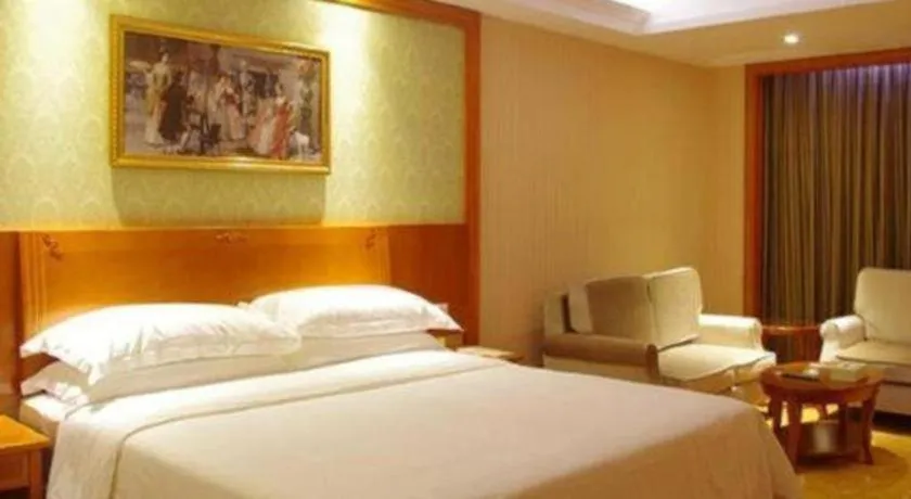 Bed in Vienna Classic Hotel Ningbo Xiangshan Wanda