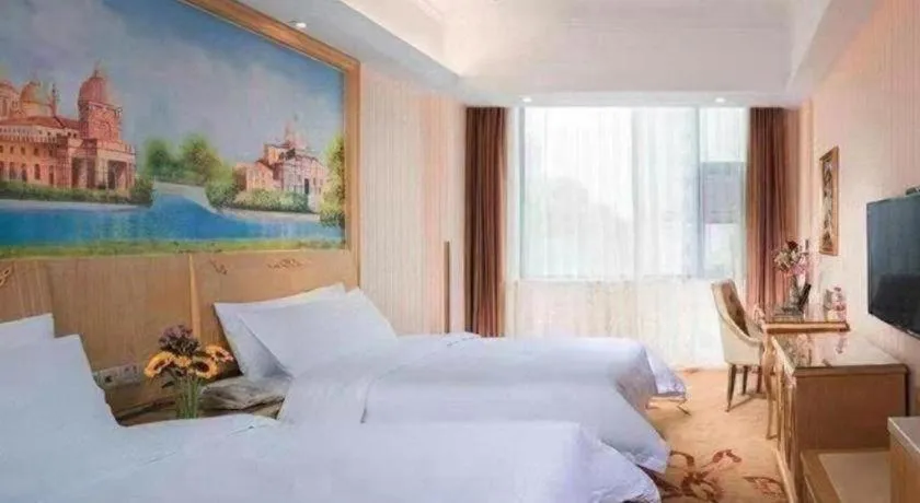 Bed in Vienna Classic Hotel Ningbo Xiangshan Wanda