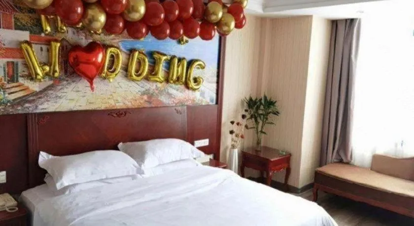 Bed in Vienna Classic Hotel Ningbo Xiangshan Wanda