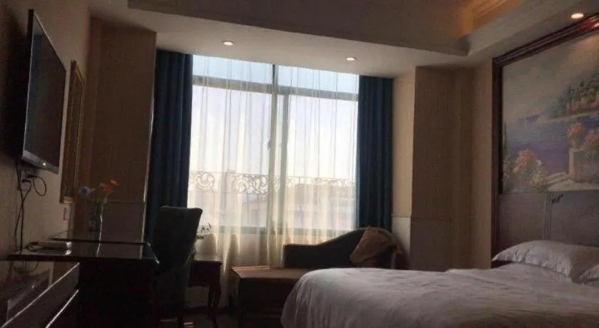 Bed in Vienna Classic Hotel Ningbo Xiangshan Wanda