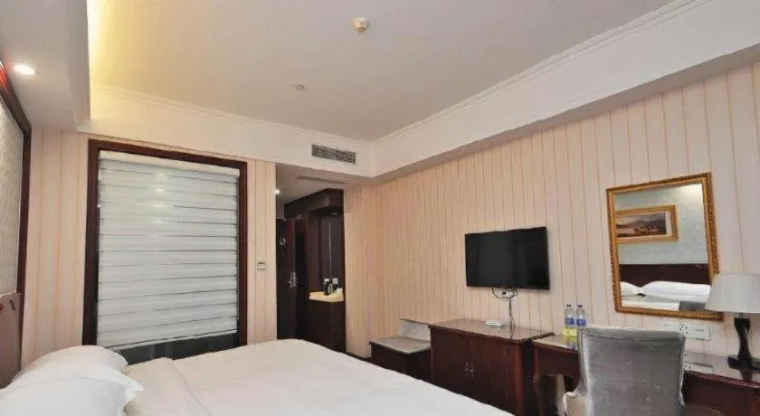 Bed in Vienna Classic Hotel Ningbo Xiangshan Wanda