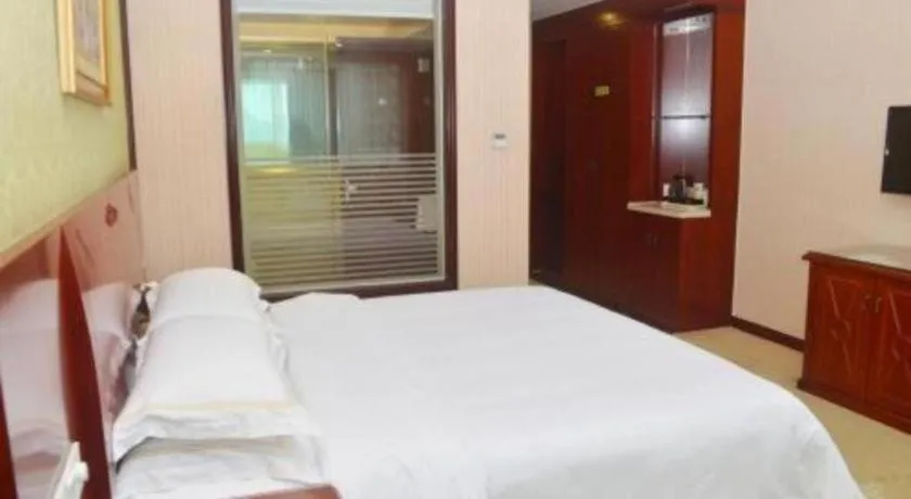 Bed in Vienna Classic Hotel Ningbo Xiangshan Wanda