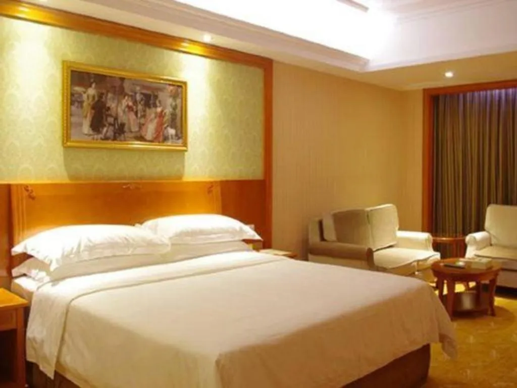 Bed in Vienna Classic Hotel Ningbo Xiangshan Wanda