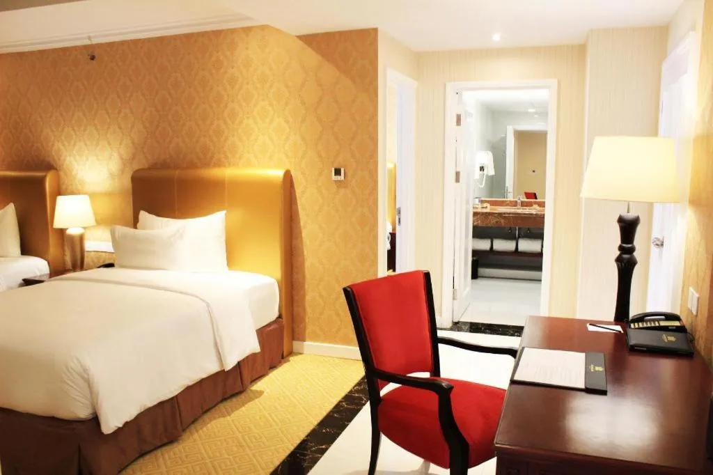 Bed in Adimulia Hotel Medan