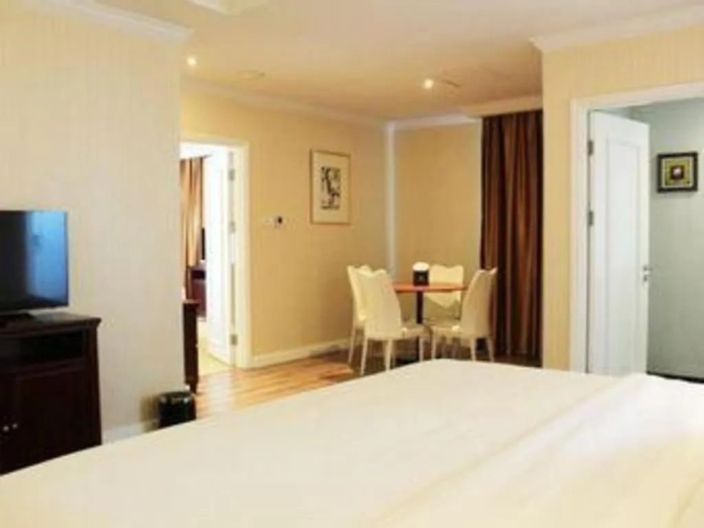 Bed in Adimulia Hotel Medan