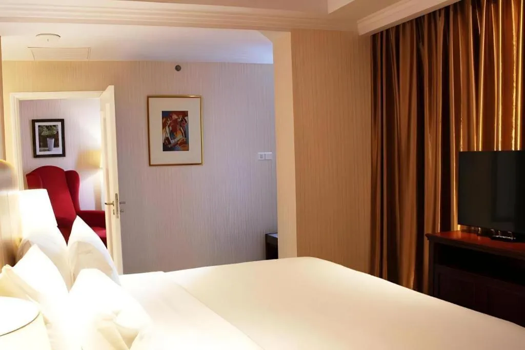 Bed in Adimulia Hotel Medan