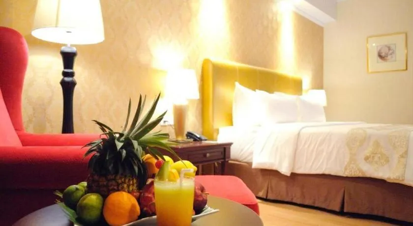 Bed in Adimulia Hotel Medan