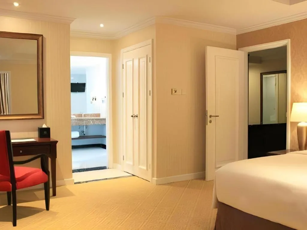 Bed in Adimulia Hotel Medan