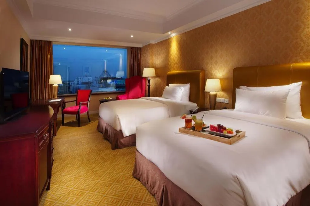 Bed in Adimulia Hotel Medan