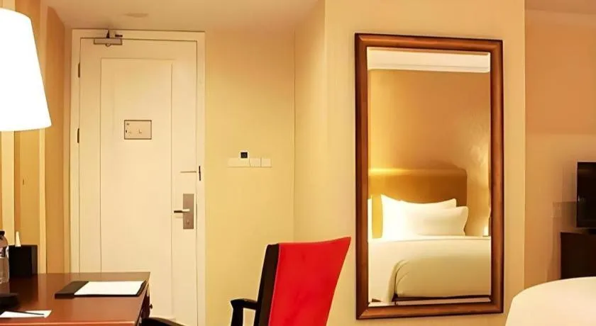 Bed in Adimulia Hotel Medan