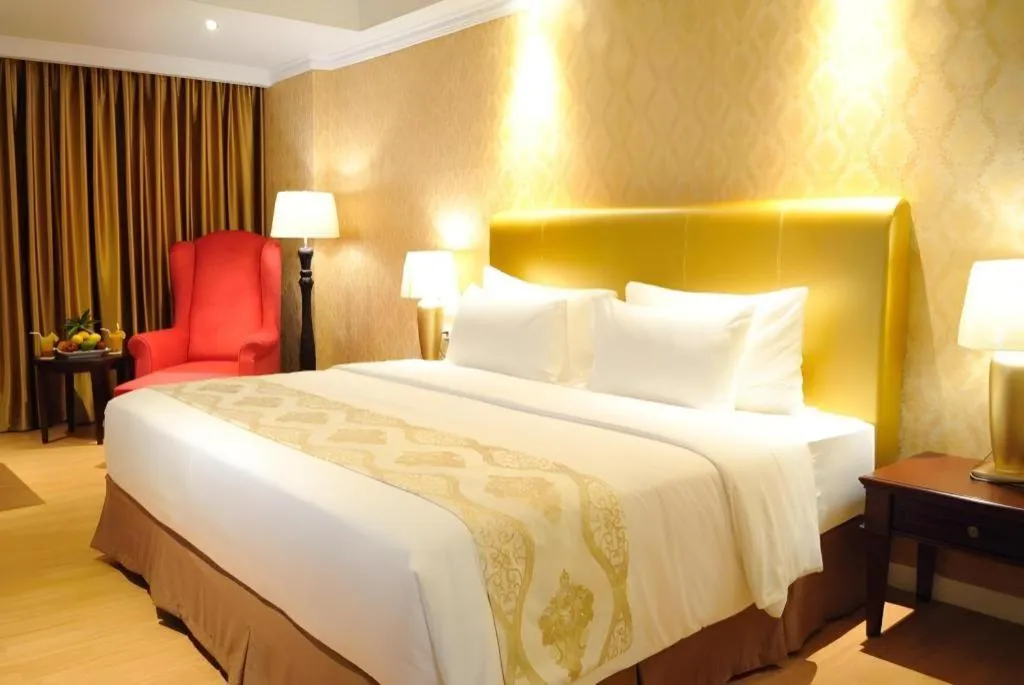 Bed in Adimulia Hotel Medan
