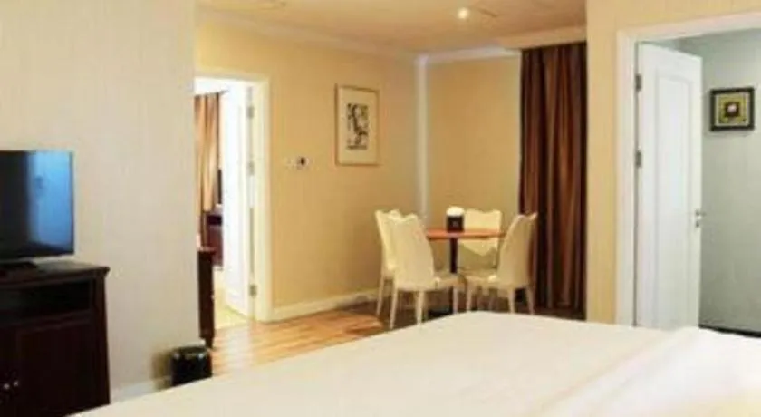 Bed in Adimulia Hotel Medan