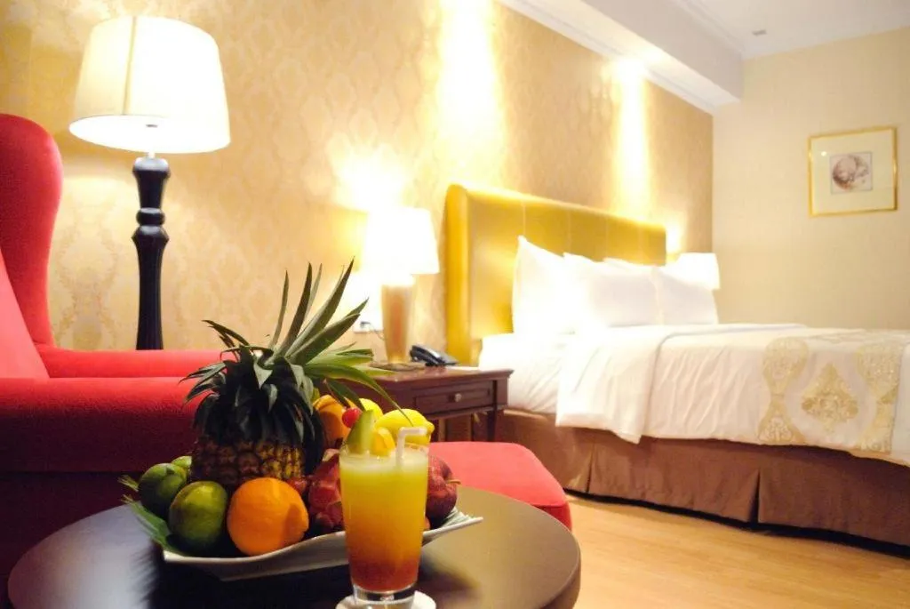 Bed in Adimulia Hotel Medan