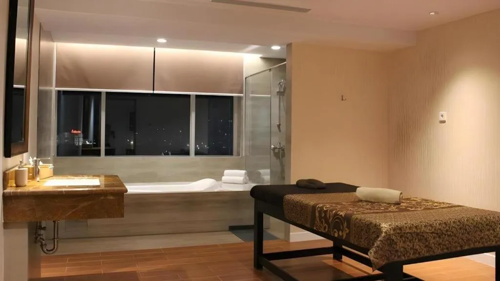 Bed in Adimulia Hotel Medan