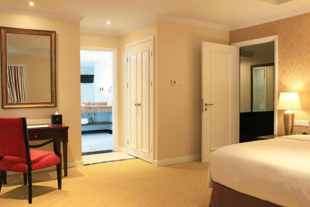 Bed in Adimulia Hotel Medan