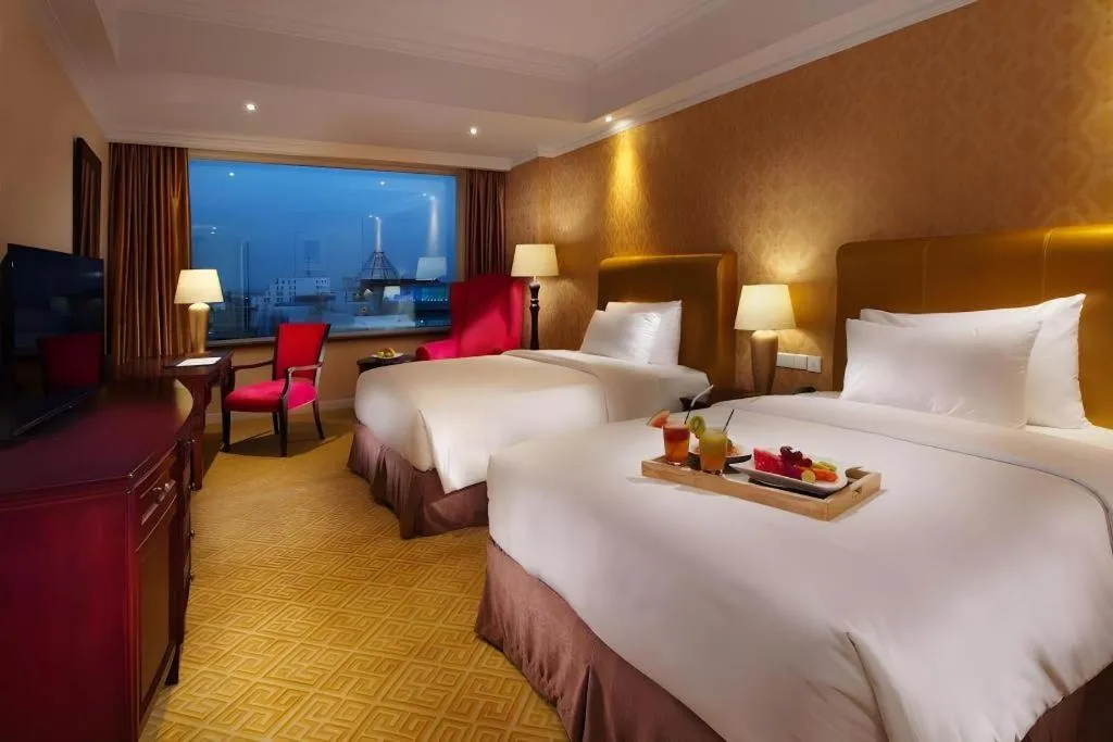 Bed in Adimulia Hotel Medan