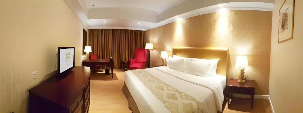 Bed in Adimulia Hotel Medan