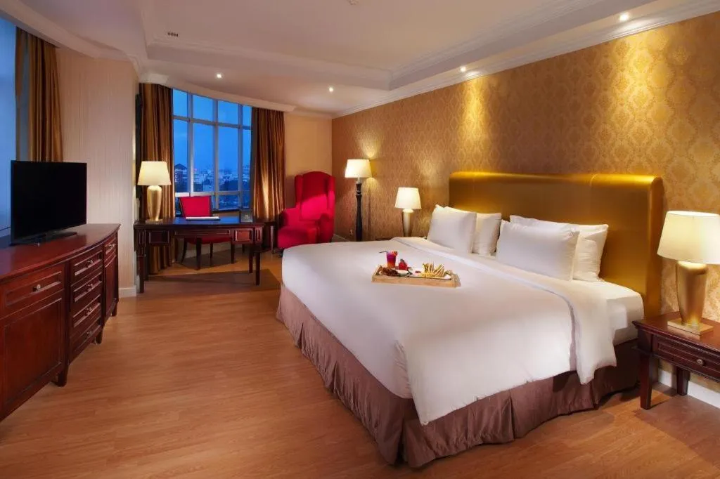 Bed in Adimulia Hotel Medan