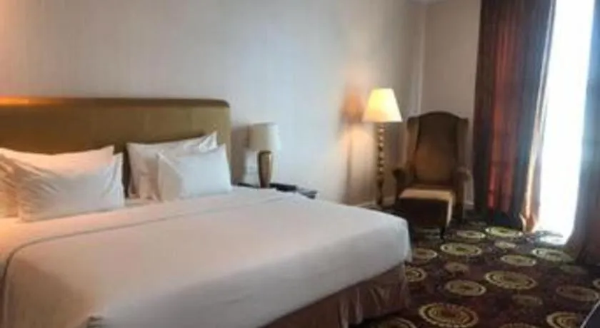 Bed in Adimulia Hotel Medan