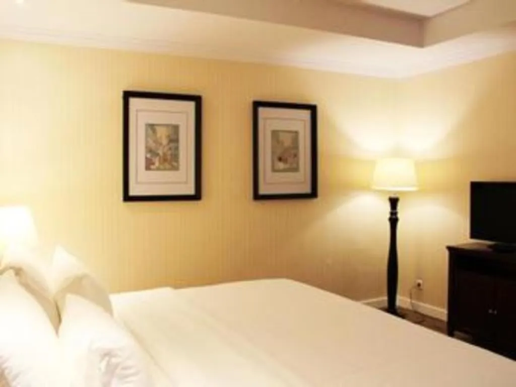 Bed in Adimulia Hotel Medan