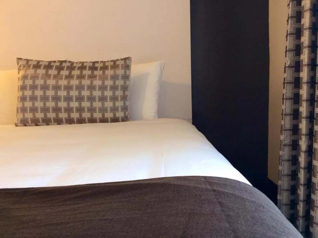 Bed in Adante Hotel, a C-Two Hotel