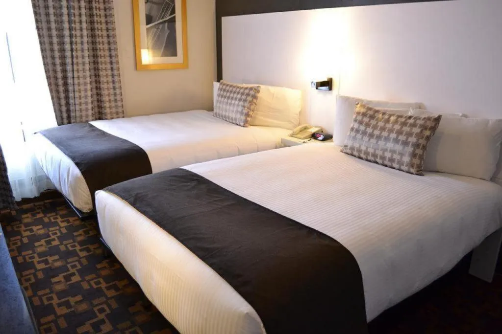 Bed in Adante Hotel, a C-Two Hotel