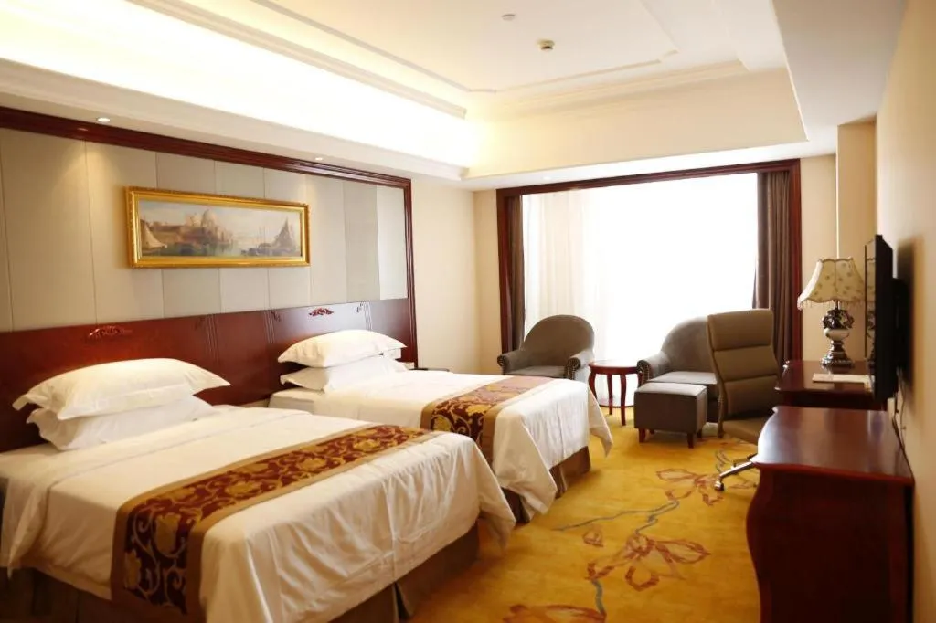 Bed in Vienna Hotel Shanghai Hongqiao Huaxin Road