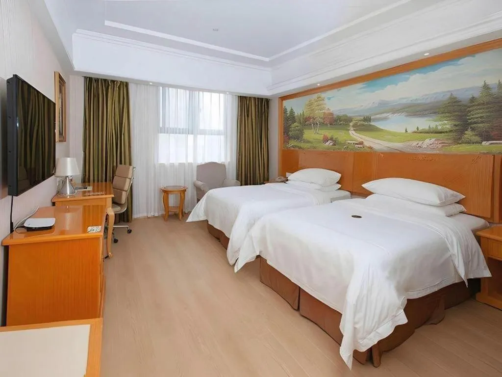 Bed in Vienna Hotel Shanghai Hongqiao Huaxin Road