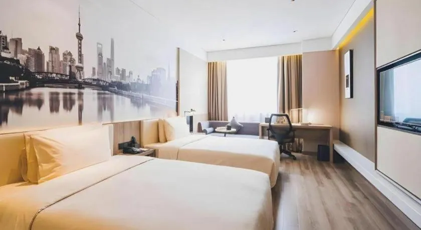 Bed in Vienna Hotel Shanghai Hongqiao Huaxin Road