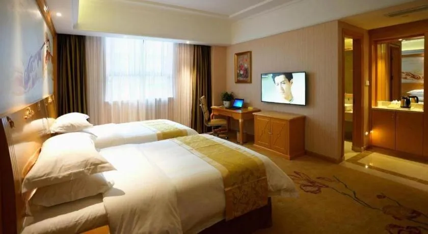 Bed in Vienna Hotel Shanghai Hongqiao Huaxin Road