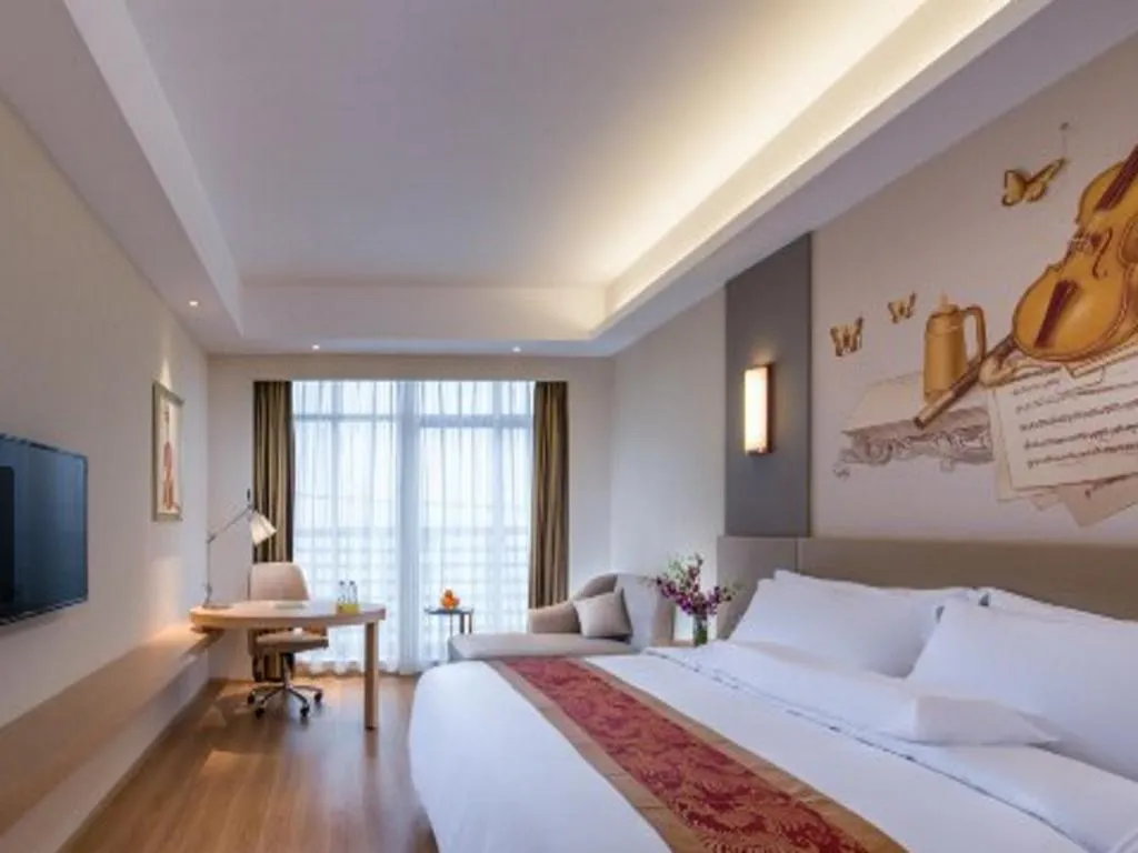 Bed in Vienna International Hotel Chengdu New Global Exhibition Center