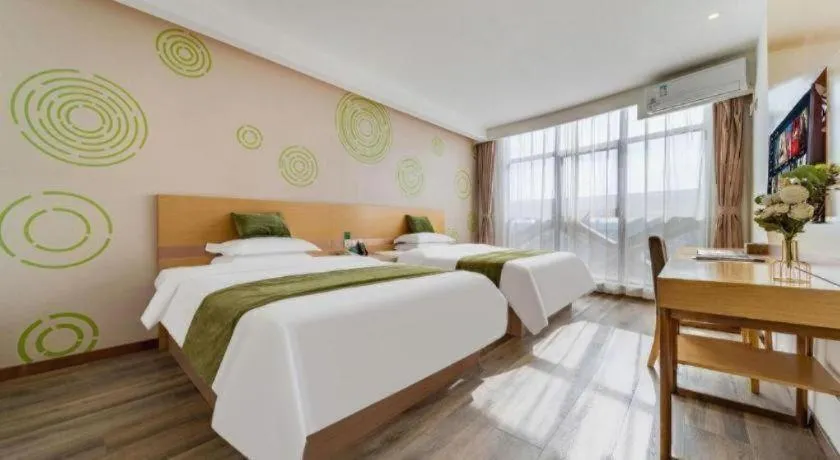 Bed in GreenTree Inn Nantong Zhangzhishan Town Deli Plaza Express Hotel