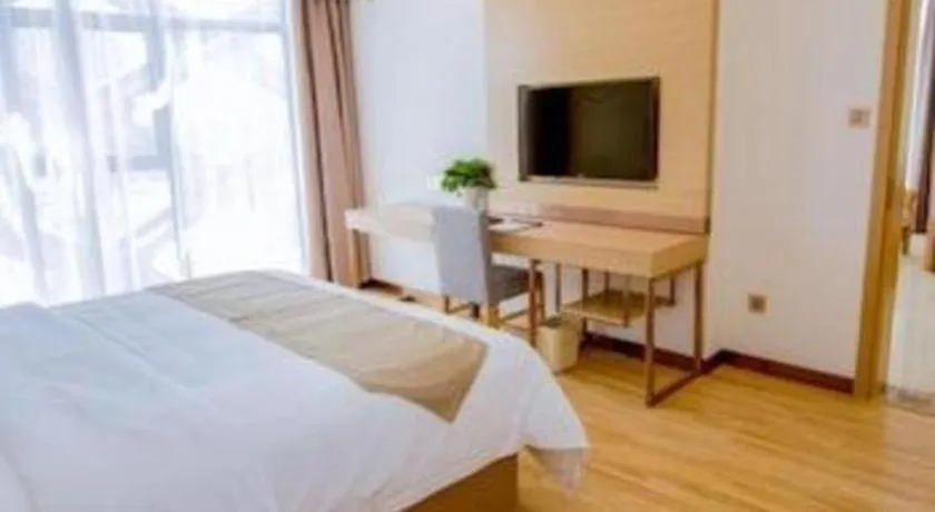 Bed in GreenTree Inn Nantong Zhangzhishan Town Deli Plaza Express Hotel
