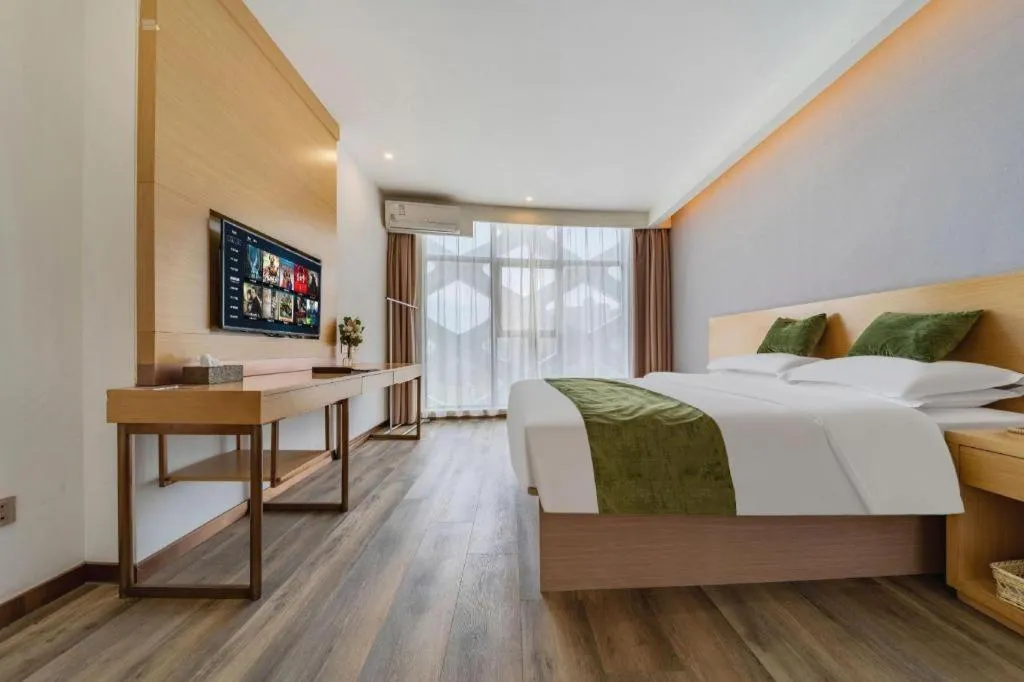 Bed in GreenTree Inn Nantong Zhangzhishan Town Deli Plaza Express Hotel