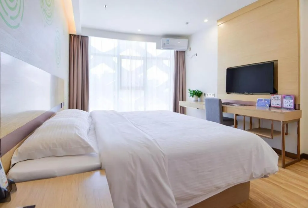 Bed in GreenTree Inn Nantong Zhangzhishan Town Deli Plaza Express Hotel