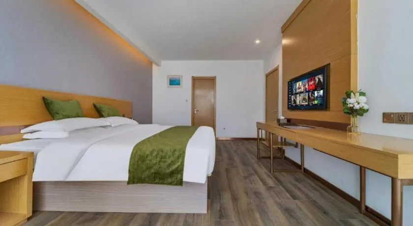 Bed in GreenTree Inn Nantong Zhangzhishan Town Deli Plaza Express Hotel