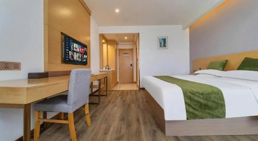 Bed in GreenTree Inn Nantong Zhangzhishan Town Deli Plaza Express Hotel