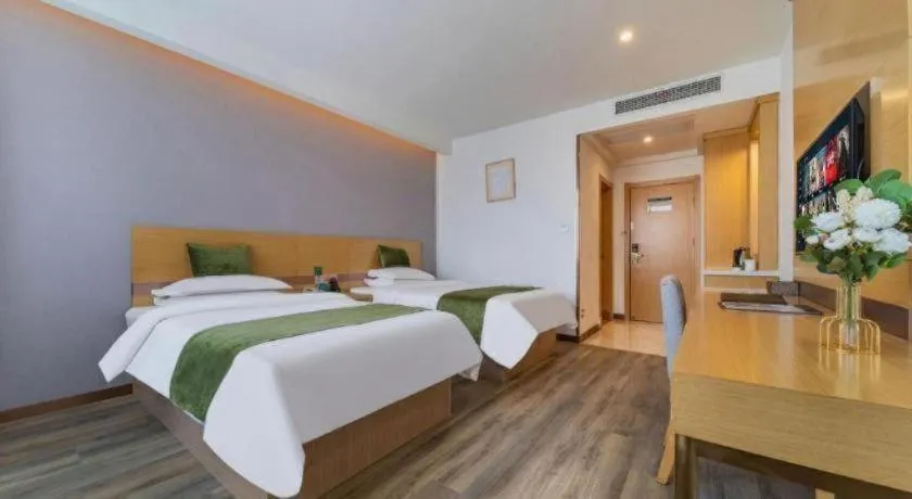 Bed in GreenTree Inn Nantong Zhangzhishan Town Deli Plaza Express Hotel