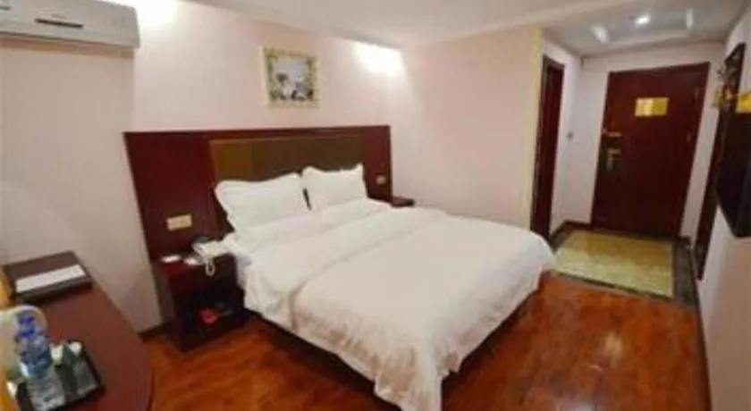 Bed in GreenTree Inn Nantong Zhangzhishan Town Deli Plaza Express Hotel