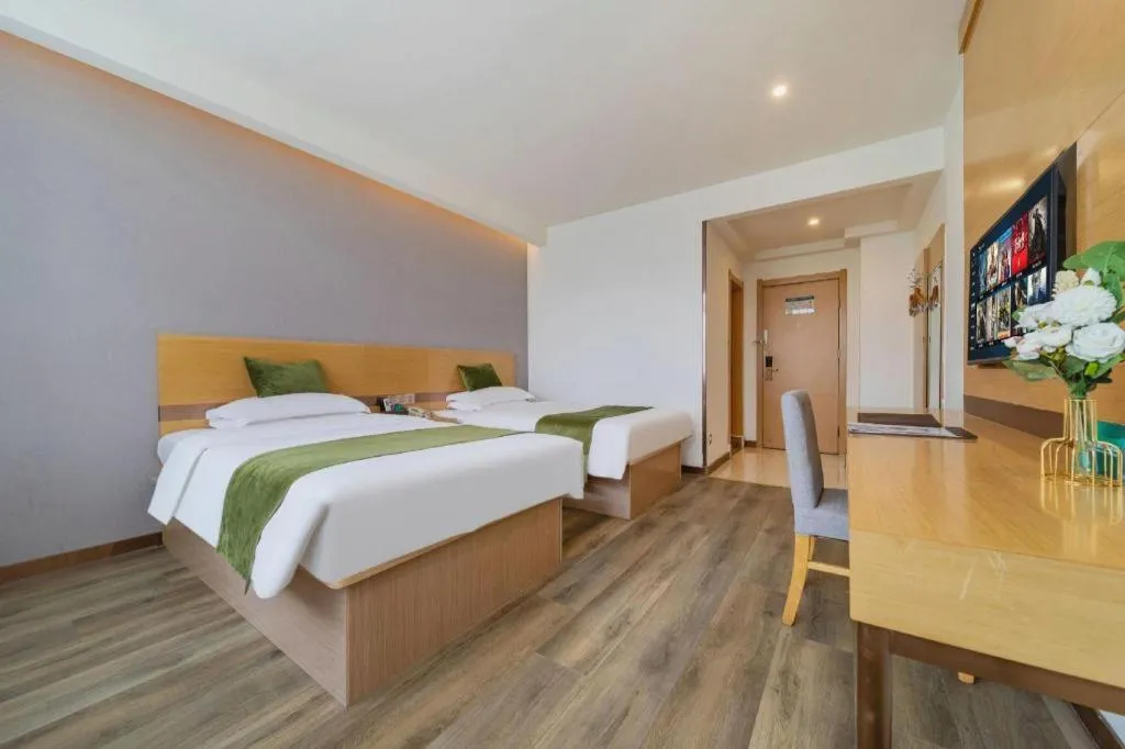 Bed in GreenTree Inn Nantong Zhangzhishan Town Deli Plaza Express Hotel