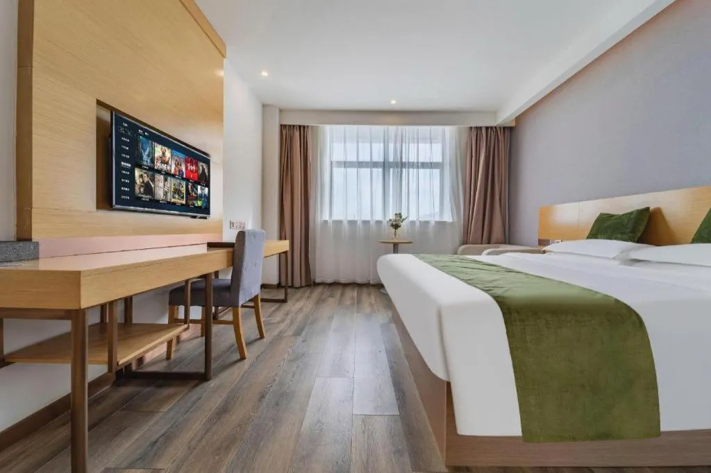 Bed in GreenTree Inn Nantong Zhangzhishan Town Deli Plaza Express Hotel
